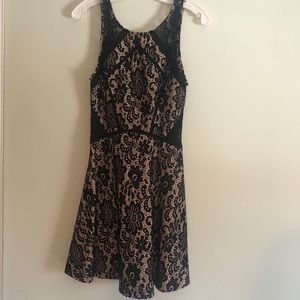 Nude and black dress